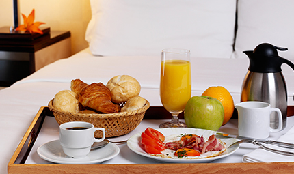 a lovely breakfast on a bed 